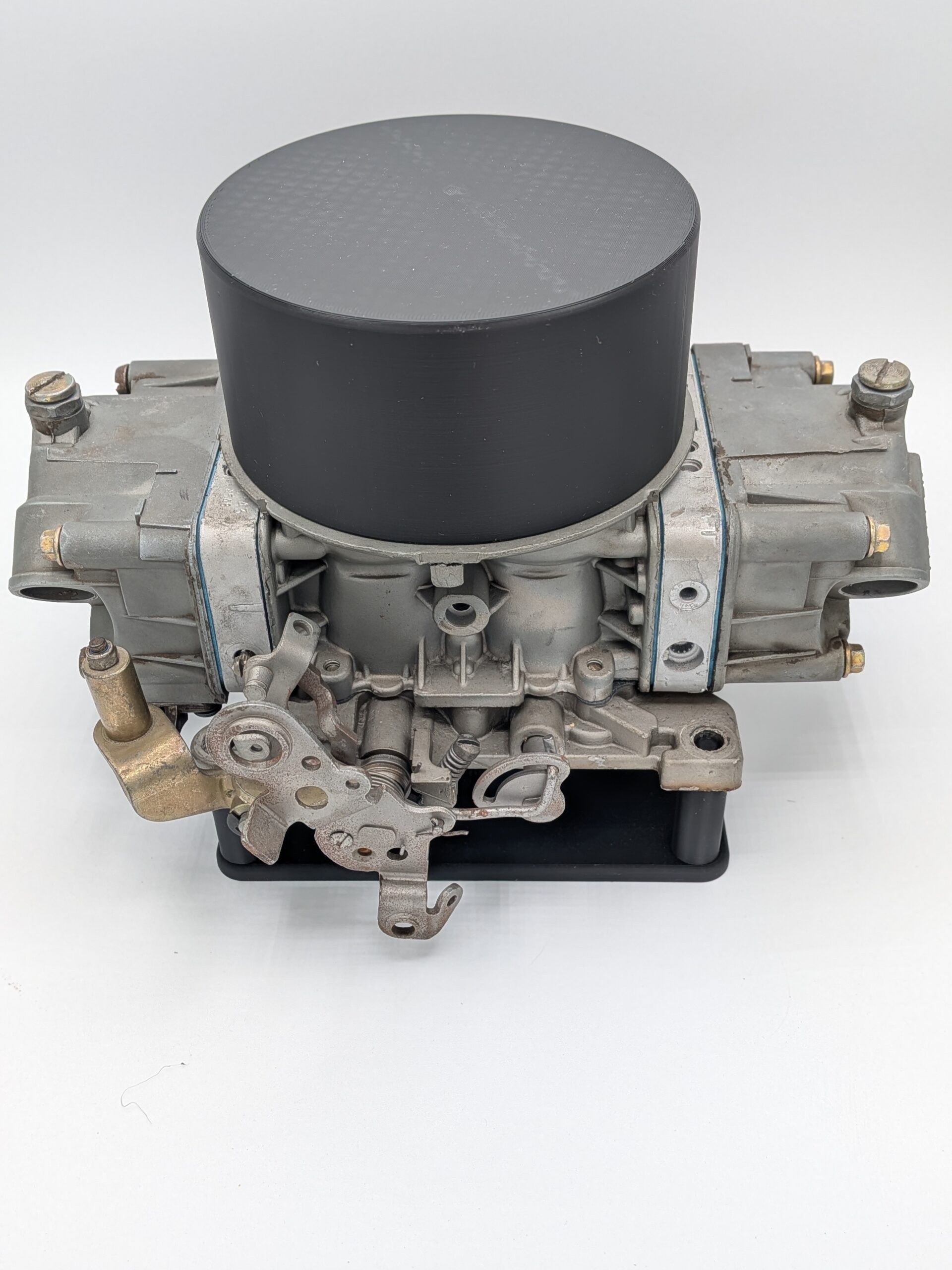 PXL_20251030_195024201.PORTRAIT Hot Rod Daycare Carburetor Display Stand